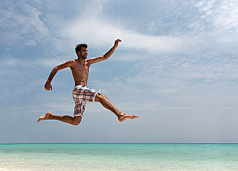 男人,跳跃,热带沙滩