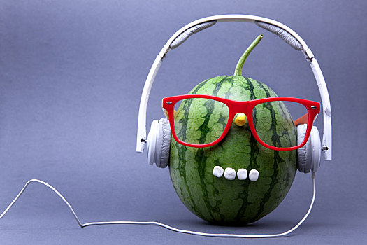 watermelon,with,eyes,and,listen,to,music