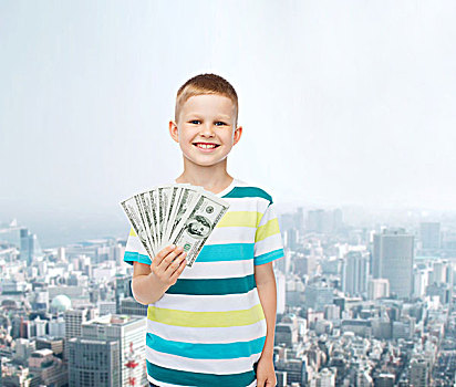 金融,计划,孩子,概念,微笑,男孩,拿着,美元,钱,给,城市,背景