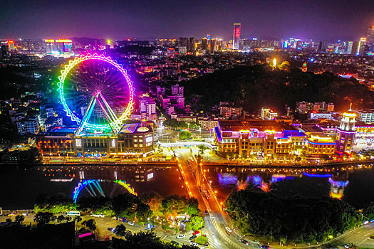 航拍广东中山岐江河畔兴中广场幻彩摩天轮夜景