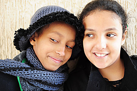 kuwait,city,portrait,of,2,happy,schoolgirls