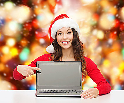 圣诞节,休假,科技,广告,人,概念,微笑,女人,圣诞老人,帽子,手指,留白,笔记本电脑,显示屏,上方,红灯,背景