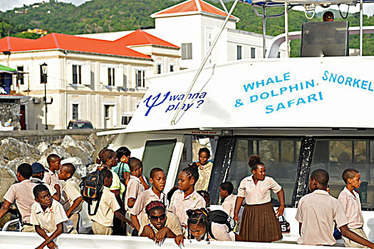 dominica,roseau,schoolchildren,embarking,for,whales,and,dolphin,tour,part,of,the,unicef,-,environmental,network,whalewatching