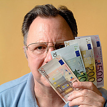 男人,拿着,欧元,货币,正面,脸