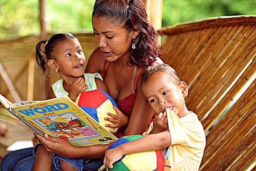 dominica,carib,territory,mother,reading,a,story,for,daughter,and,son