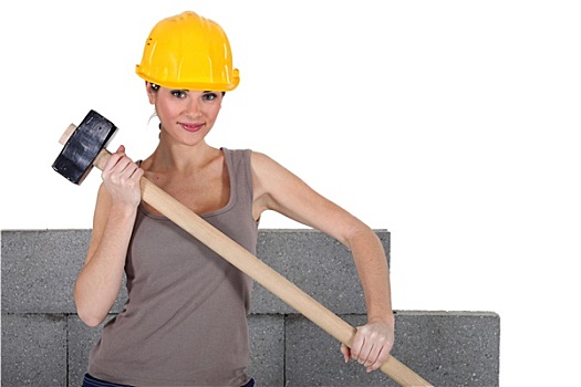 女性,砖匠,拿着,锤子,混凝土墙,背景