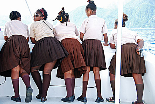 dominica,roseau,schoolchildren,looking,for,dolphins,and,whales,on,the,boat,during,unicef,-,environmental,network,whalewatching,progra