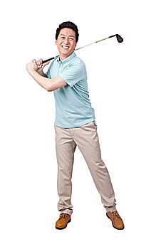 一个打高尔夫球的青年男士