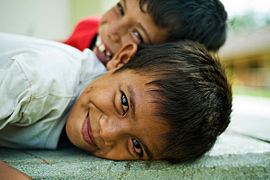 indonesia,sumatra,banda,aceh,portrait,of,2,young,boys,smiling