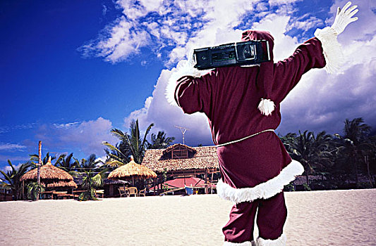 圣诞老人,无线电,嬉戏,愉悦,背面视角,人,男人,掩饰,海滩,沙滩,象征,圣诞节,度假,旅游,复原,放松,暂停,休闲