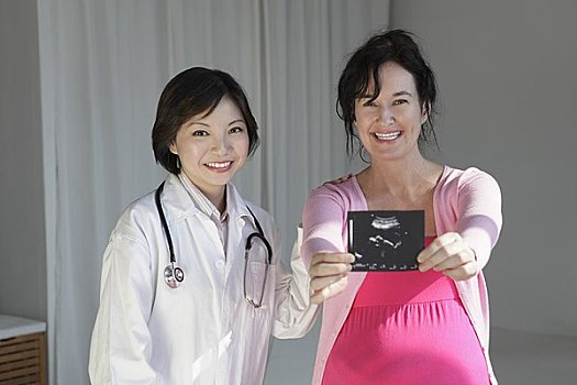 女医生,孕妇,拿着,超声波扫描图