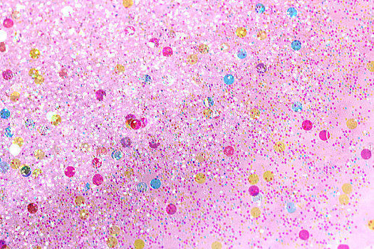 闪烁的粉色珍珠细沙背景