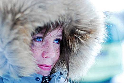 iceland,reykjavik,portrait,of,schoolgirl,with,hat,standing,in,the,cold