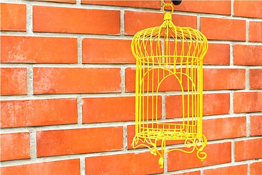 黄色,鸟笼,砖墙,背景