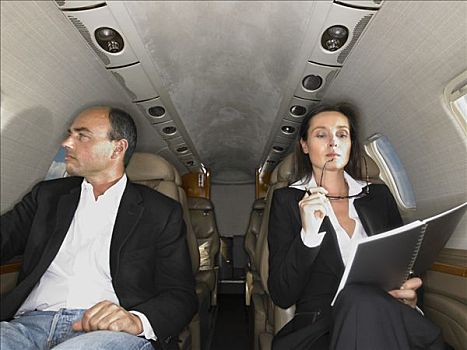 职业女性,商务人士,坐,室内,私人飞机