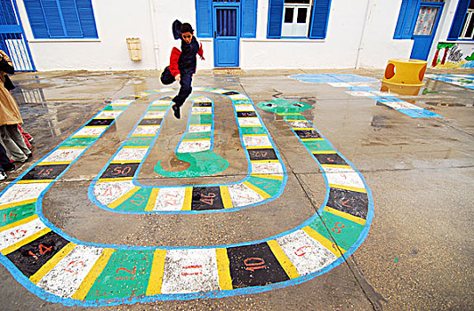 libya,tripoli,children,of,mixed,race,jumping,out,happiness