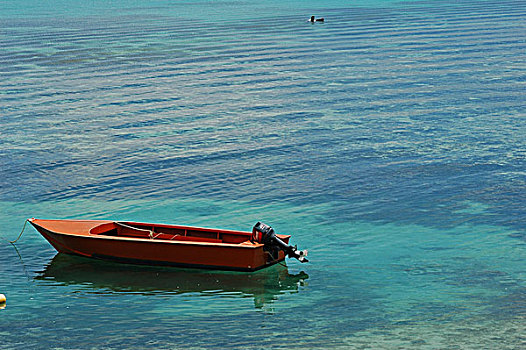 tuvalu,funafuti,schoolgirl,in,blue,uniform,writing,on,a,paper,the,classroom