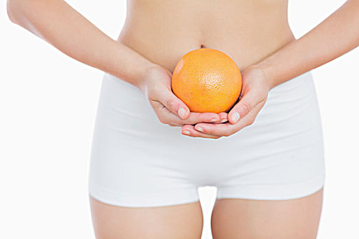 腹部,健身,女人,拿着,新鲜,橙色,上方,白色背景