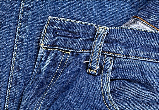 蓝色牛仔裤,口袋