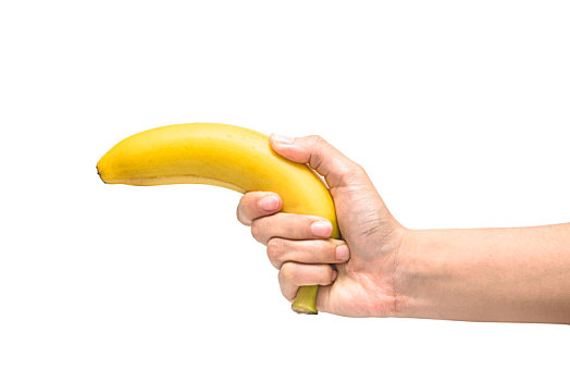 手握一根香蕉在白色背景上
