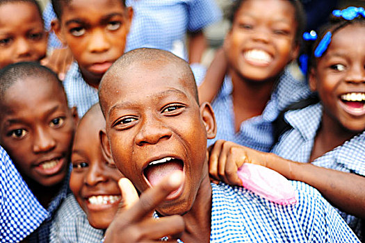 haiti,croix,des,bouquets,making,grimace,in,front,camera