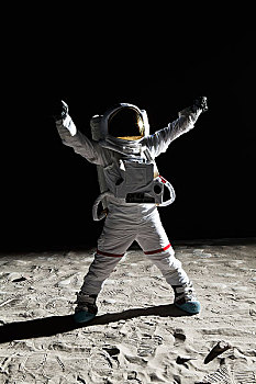 宇航员,月亮,抬臂,胜利