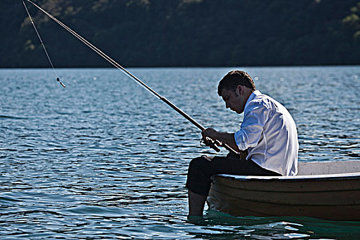 商务人士,钓鱼,划桨船