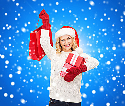高兴,寒假,圣诞节,人,概念,微笑,少妇,圣诞老人,帽子,礼物,购物袋,上方,蓝色,雪,背景