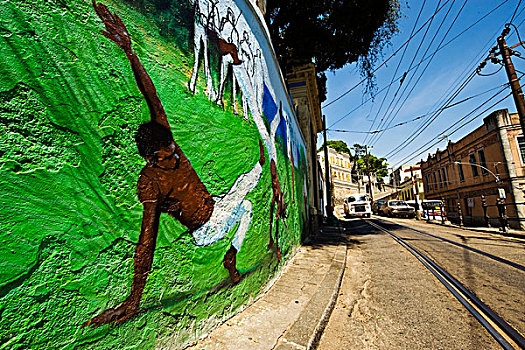 brazil,rio,de,janeiro,santa,teresa,bonde,tram,street,with,green,capoeira,wall,painting