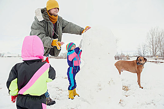 父亲,孩子,建筑,雪人