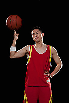篮球手,旋转,球,一个,手指,黑色背景