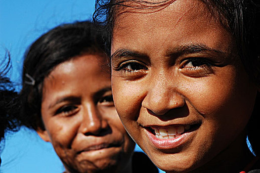 portrait,of,a,timorese,girl,looking,to,the,camera