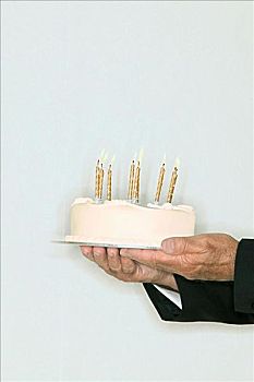 长者,拿着,生日蛋糕