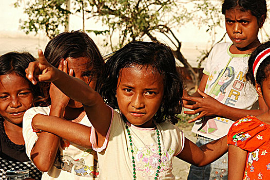 oxfam,ngo,4x4,car,crossing,the,empty,street,of,dili