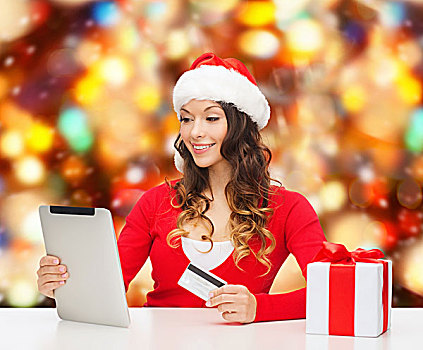 圣诞节,休假,科技,购物,概念,微笑,女人,圣诞老人,帽子,礼盒,信用卡,平板电脑,电脑,上方,红灯,背景