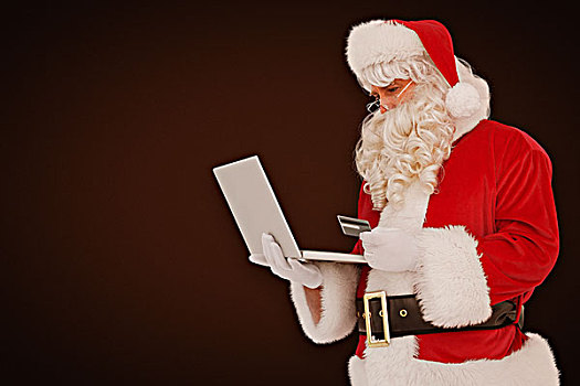 合成效果,图像,圣诞老人,网上购物,笔记本电脑,白色背景,虚光照