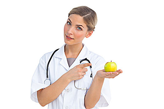医护人员,指向,青苹果,白色背景