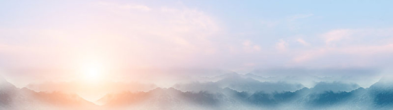 中国风水墨风格日落山脉风光背景图