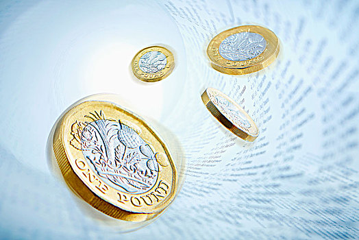 一英镑硬币,围绕,股市数据