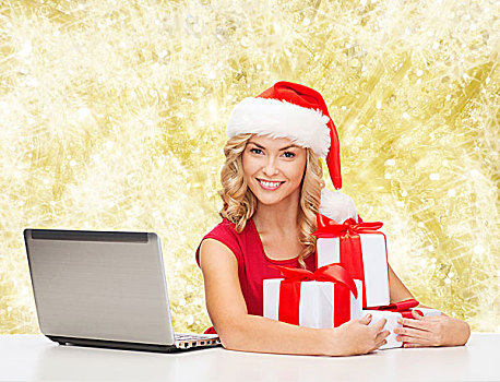 圣诞节,休假,科技,人,概念,微笑,女人,圣诞老人,帽子,礼物,笔记本电脑,上方,黄光,背景