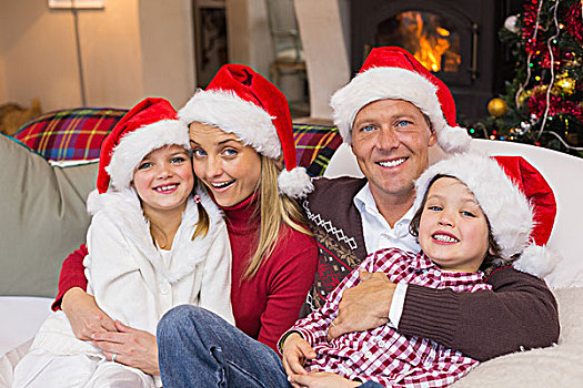 喜庆,家庭,圣诞帽,搂抱,沙发