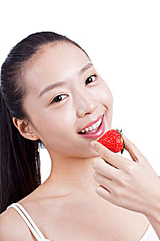 休闲女士吃草莓