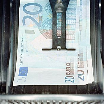 欧元钞票,收款机
