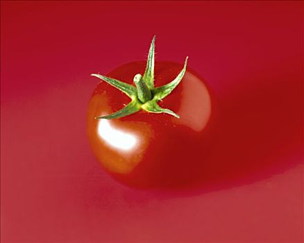 西红柿,红色背景