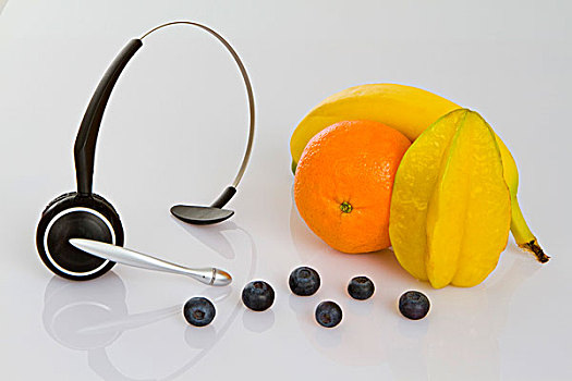 耳机,克莱门氏小柑橘,杨桃,阳桃,香蕉,蓝莓,象征,健康饮食,工作