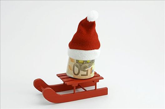 卷,钞票,戴着,圣诞帽,骑,雪撬,象征,圣诞节