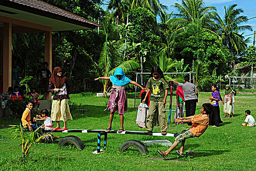 indonesia,sumatra,banda,aceh,children,playing,in,playground