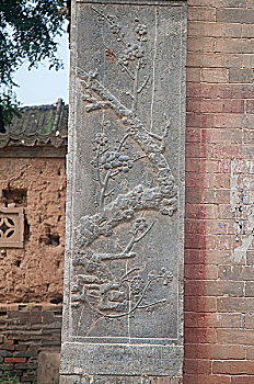 河南洛阳伊川县老宅子墙上的石浮雕