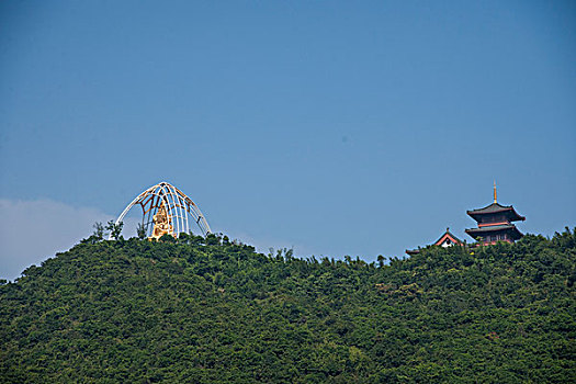 广东省深圳市大梅沙东部华侨城大华兴寺四面观音坐莲金佛