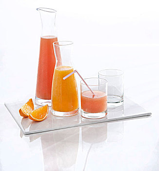 玻璃瓶,玻璃杯,橙色,粉红葡萄柚,果汁